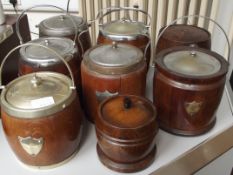 Collection of 8 wooden biscuit barrels