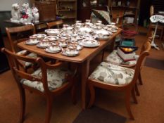 Dining table with 4 chairs and 2 carvers.