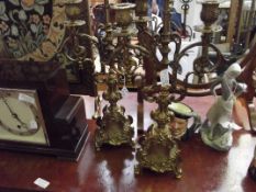 Pair of brass candlabra