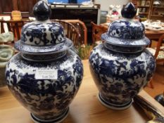 Pair of lidded temple jars