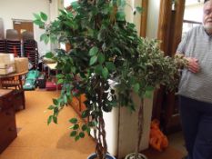 Two artificial plants with pots