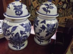 Pair of lidded jars (one A/F)