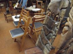 Carved African chair with antelope and elephant