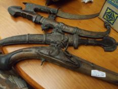 Pistol and 3 knives