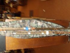 Fishing umbrella with split cane rod