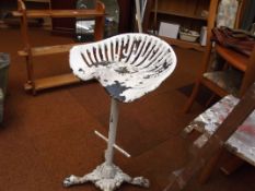 Metal tractor seat made into a chair