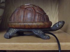 Glass and metal tortoise lamp
