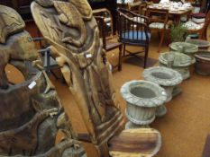 Carved African chair with fish and birds