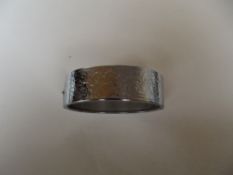 Broad silver hinged bangle