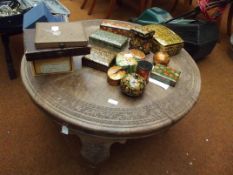 Carved round coffee table