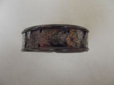 Broad silver hinged bangle
