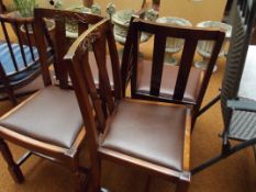 Set of 4 oak dining chairs.