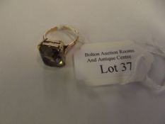 9ct gold ring with large smoky quartz stone