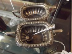 Pair of silver hall marked salts with silver spoon