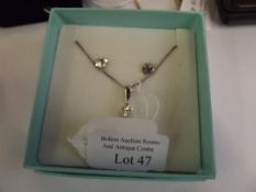 Silver earrings and chain and pendant set