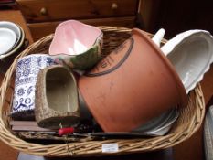 Wicker basket with content to include a maling bow