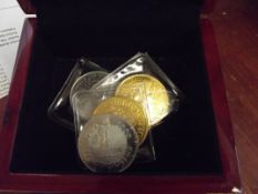 3 coins to include a £5 coin
