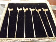 Set of silver cocktail sticks