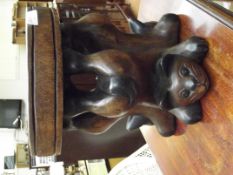 Carved seat depicting cats