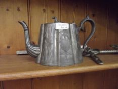Pewter teapot and one other