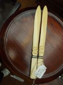 2 page turners, possible ivory