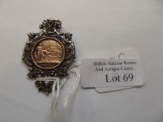Silver swimming medal with 9ct gold inset