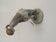 Lladro figure of a lady golfer 28cm high