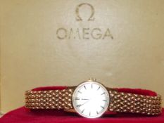 Omega ladies wristwatch 9 ct gold case and strap w