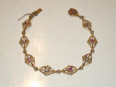 An unusual Victorian 18ct gold ruby and diamond br