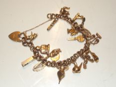 9ct gold charm bracelet with 20 charms total weigh