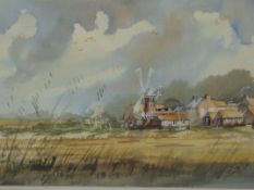 Ian King, watercolour, rural scene with windmill and houses in the distance, 36cm x 54cm