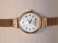 Avia ladies wristwatch 9ct gold case and strap man