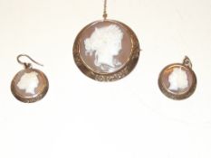 Yellow metal cameo brooch and earring set