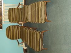 Pair of of stick back Ercol Windsor open armchairs