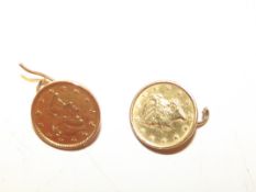Two 1854 one dollar gold coins mounted