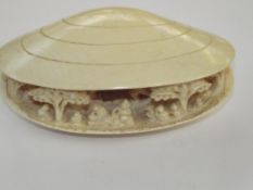 Late 19th century ivory clam shell, intricately ca