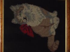 19th century Berlin woolwork, depicting a seated cat with glass eyes, framed and glazed, 46cm x