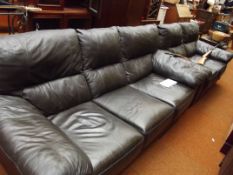 Black leather two piece suite by Dolce Vita