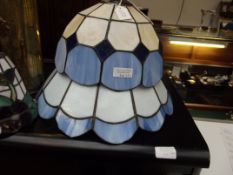 Two leaded glass light shades