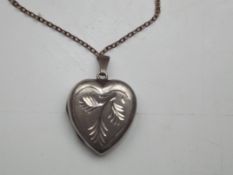 Silver heart shaped pendent and chain