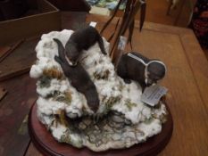 Border Fine Arts otter group 'Snow Slide'