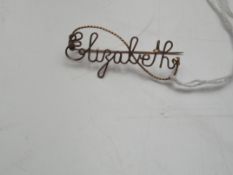 Yellow metal brooch - Elizabeth
