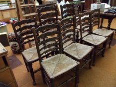 Set of eight ladder back and rush seated dining ch
