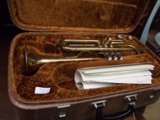 Brass trumpet in fitted case with two mouth pieces