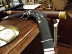 Boomerang together with a didgeridoo
