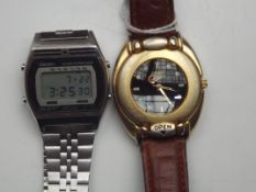 A vintage Seiko Alarm and a Nike compass/wristwatc