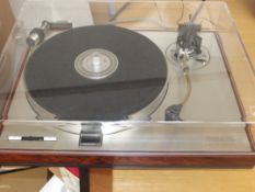 Luxman turntable in rosewood case