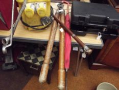 Pair of bolt cutters togther with a 1960's umbrell