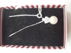 Silver necklace with a pearl pendant