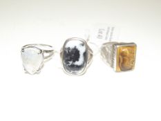 3x Silver rings - One with large white moon stone,